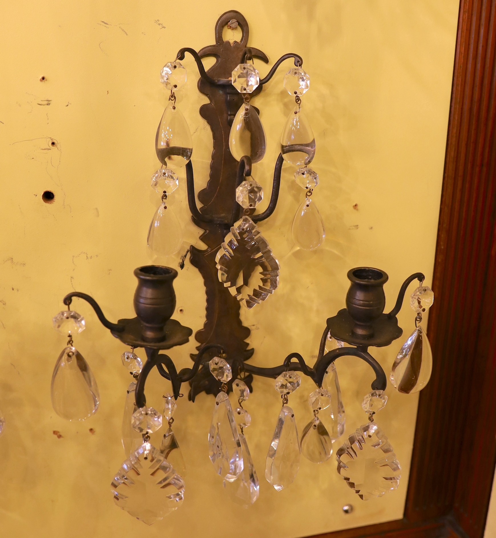 A pair of late 19th century French bronze metal and cut glass twin branch and wall lights, height to the lowest drop 42cm